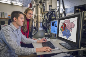Eva Nogales and Robert Louder at electron microscope 