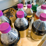 Ionic liquids used to break down cellulosic biomass