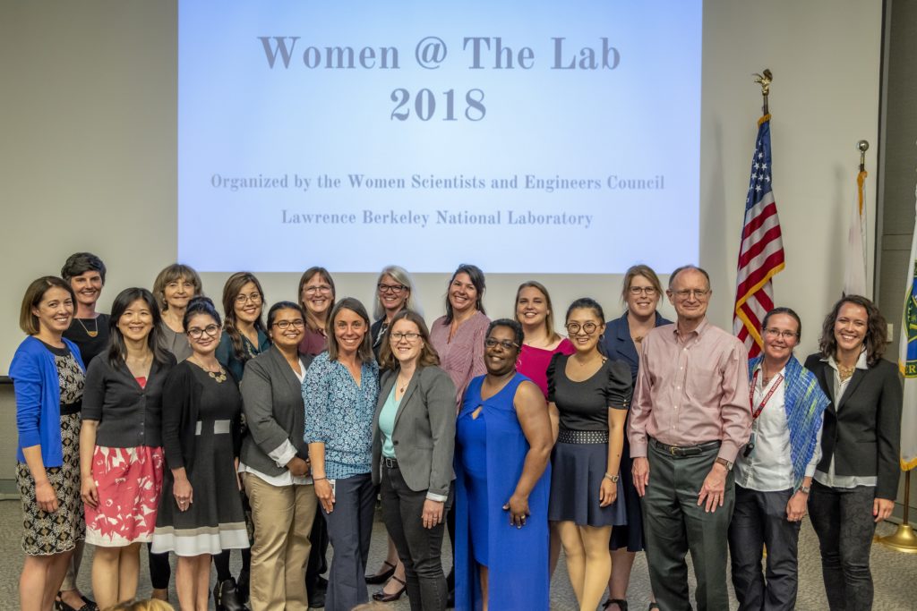 16 recipients of the Women @ The Lab awards ceremony with Lab Director Mike Witherell 