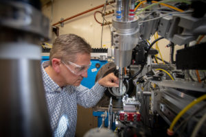 Marc Allaire works on an ALS beamline in this May 2019 photo. (Credit: Thor Swift/Berkeley Lab)