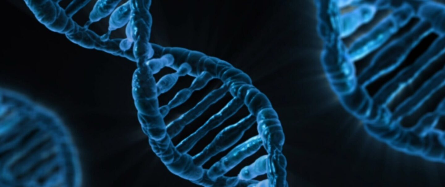 blue DNA helix structures floating against a dark background