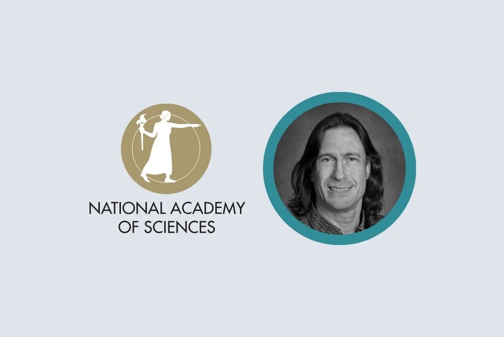Photo of award recipient and NAS logo against a grey background.